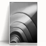 Mid-century modernist art of Barcelona skyline in muted pastel shades, acrylic print framed in white.