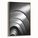 Framed canvas wall art depicting a vintage-style Barcelona landscape in muted gold and black tones, ideal for bedroom decor.