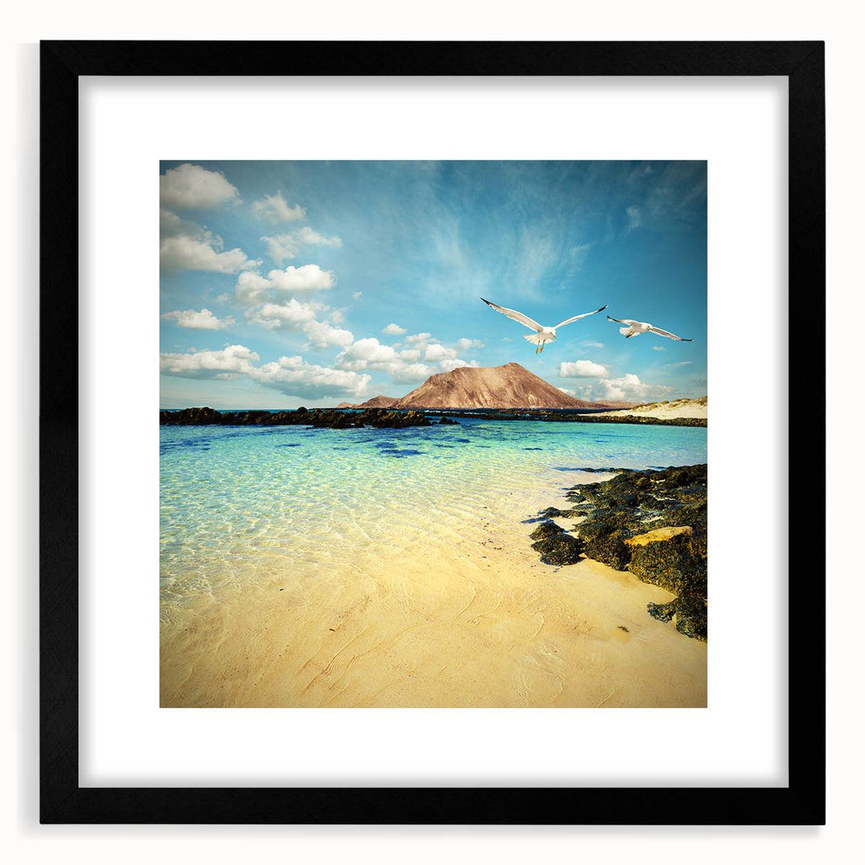 Colorful abstract art print featuring textured scenery of Spain’s Canary Islands in a black frame.