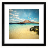 Colorful abstract art print featuring textured scenery of Spain’s Canary Islands in a black frame.