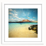 Textured abstract art print of a European scenery in muted earth tones, framed in white, suitable for bedroom decor.