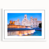 Abstract art print of Madrid skyline in muted earth tones on a framed white canvas, suitable for dining room decor.