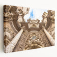 Large canvas print depicting a vibrant street scene in Valencia with warm orange and red tones, ideal for kitchen wall art.