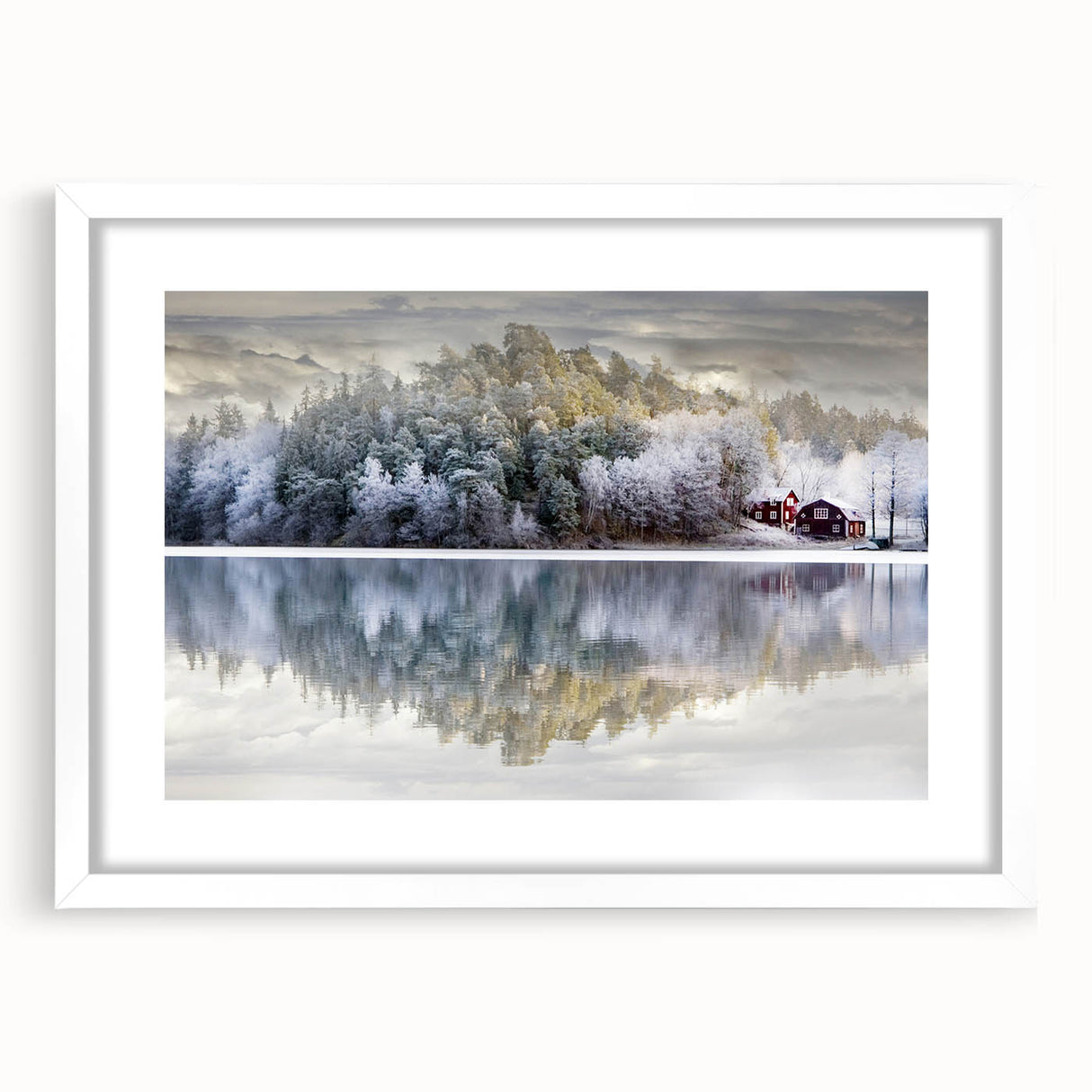 Abstract art print of a European landscape in muted blue and green tones on a white framed canvas.