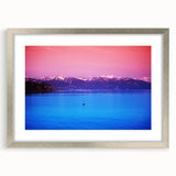 Textured abstract art print of Geneva scenery in muted earth tones, framed with a silver mat, suitable for bedroom decor.