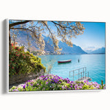 Vintage poster art of a Swiss landscape on framed canvas, featuring vibrant colors against a black background.