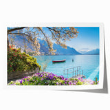 Extra large rolled print of a Swiss landscape with vibrant green meadows and distant mountains.