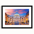 Colorful abstract art print of a European cityscape, in a large black frame with mat, suitable for living room decor.
