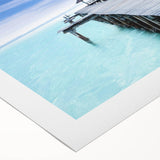 Art deco poster of Cancun scenery in vibrant blue and green tones on rolled canvas, suitable for dining room decor.