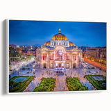 Vintage poster art of Mexico City on a framed canvas, featuring colorful artwork against a black background.