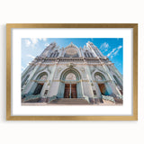 Extra large abstract art print depicting textured scenery of Guanajuato, in muted earth tones, framed in gold.