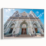 Vintage poster art of Guanajuato, Mexico featuring colorful buildings on a black framed canvas, ideal for living room decor.