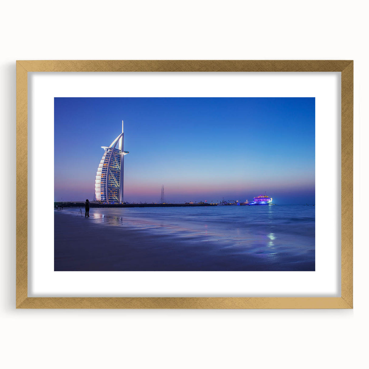 Extra large abstract art print of Dubai skyline in gold frame, featuring textured details and muted earth tones.