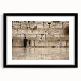 Colorful abstract art print of Jerusalem in vibrant hues on a textured canvas, framed in black, ideal for living room decor.