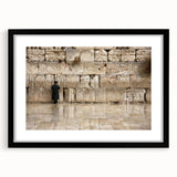 Colorful abstract art print of Jerusalem in vibrant hues on a textured canvas, framed in black, ideal for living room decor.