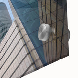 Large abstract wall art depicting the Tel Aviv skyline in muted blue and gray tones, acrylic glass.