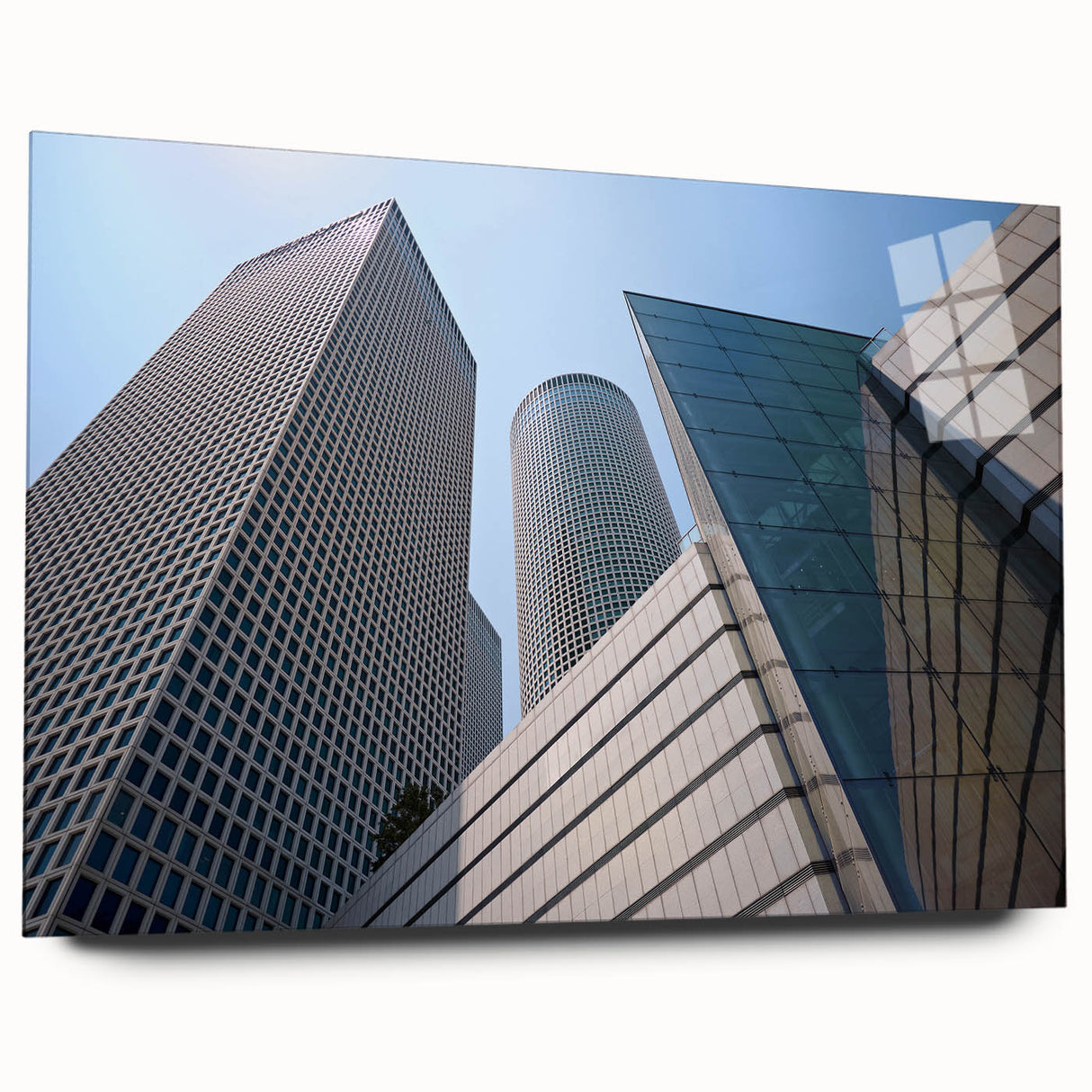 Large abstract wall art of Tel Aviv skyline in muted blue and gray tones on acrylic glass.