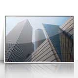 Art deco poster of Tel Aviv skyline in muted gray and blue tones on a framed acrylic, ideal for modern art wall decor.
