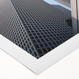 Art Deco poster of Tel Aviv skyline in muted gold and blue tones on rolled canvas, suitable for dining room wall art.