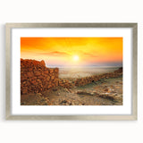 Textured abstract art print of a Middle Eastern scenery in muted earth tones, framed with a silver mat.