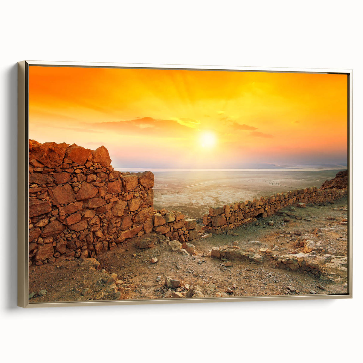Framed canvas depicting a vintage-style landscape of Middle Eastern scenery in gold and black tones.