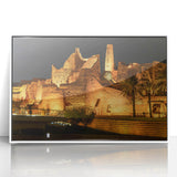 Art deco poster depicting a stylized Saudi Arabian landscape in muted earth tones on a framed acrylic panel.