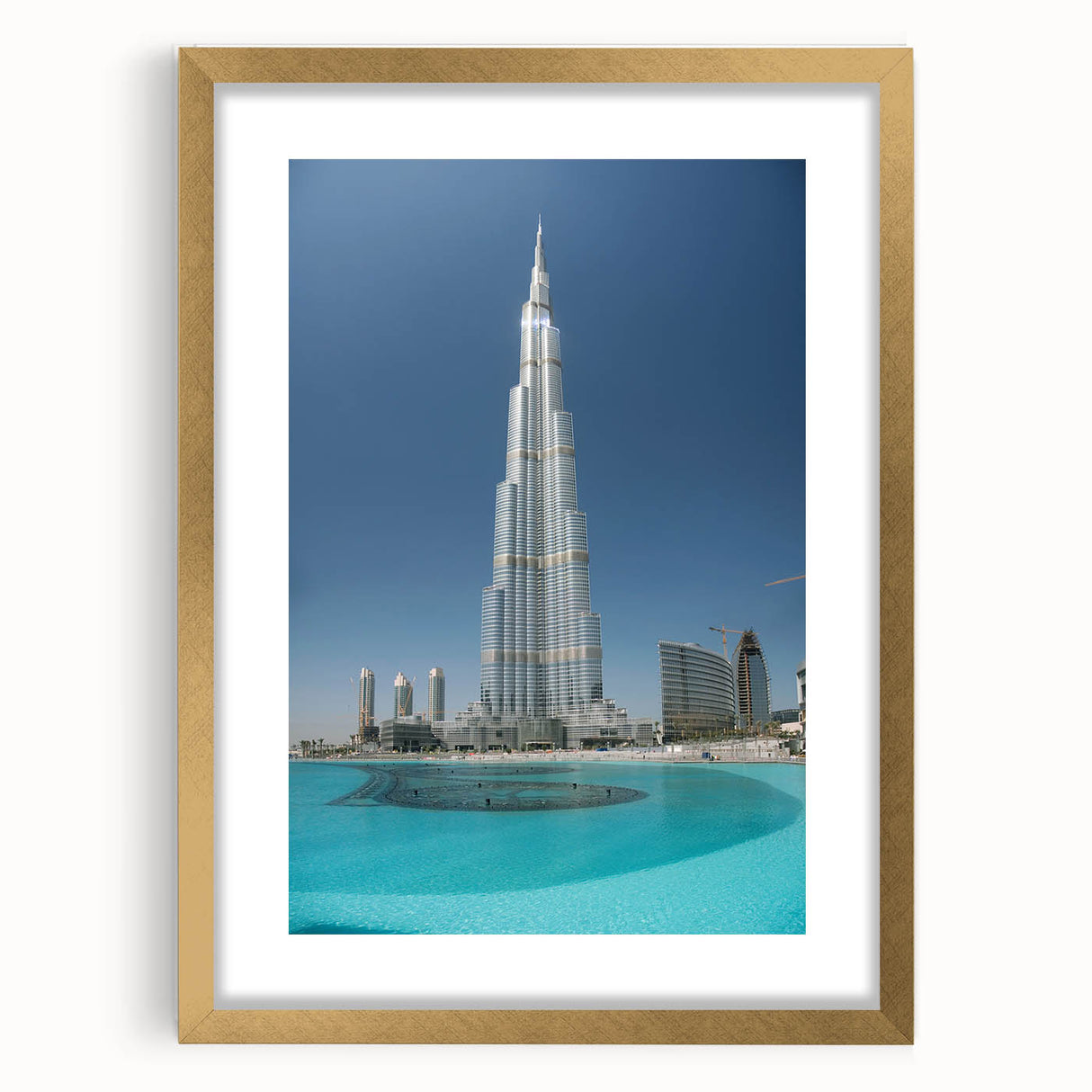 Extra large wall art featuring an abstract depiction of Burj Khalifa in textured gold and black tones.