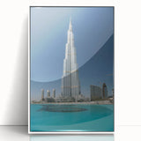 Acrylic print of the Burj Khalifa in muted gray tones, framed in white, suitable as modern art wall decor.