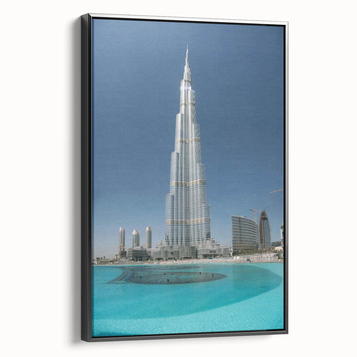 Black and white wall art of the Burj Khalifa, framed canvas in a vintage poster style, ideal for bedroom decor.