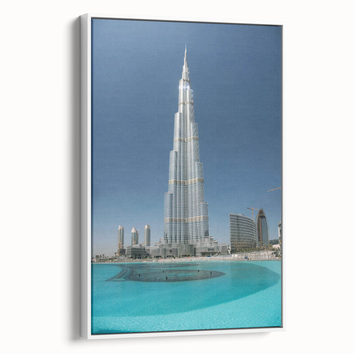 Vintage poster art of the Burj Khalifa on a framed canvas in muted black and colorful accents, ideal for living room decor.