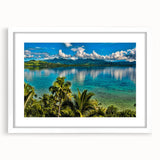 Abstract art print of a serene oceanic scene in muted blue and white tones on a framed white mat.