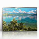 Mid-century modernist art depicting a serene Fiji scenery in cool blue tones, framed in silver acrylic.