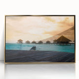 Mid-century modernist acrylic print of Bora Bora scenery with vibrant blue hues, framed in gold.