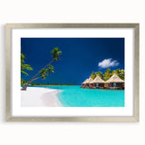 Textured abstract art print of Tahiti's oceanic scenery in muted blue tones, framed in silver, ideal for bedroom wall decor.