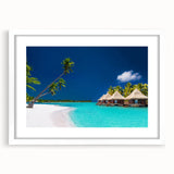 Abstract art print depicting serene Tahitian landscape in muted blue and green tones on a framed white mat.