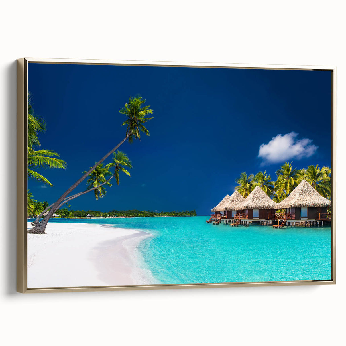 Landscape painting of Tahiti with lush greenery and ocean in gold frame.