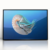 Large abstract wall art featuring a Micronesian oceanic scenery in muted blue and green tones, framed in black acrylic.