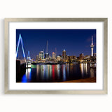 Textured abstract art print of Auckland skyline in muted blue tones on framed canvas, ideal for bedroom art.