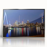 Framed acrylic print of Auckland skyline in muted blue tones, ideal for modern art wall decor.