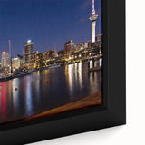Extra large black wall art featuring a textured Auckland skyline in colorful hues, framed canvas ideal for living room decor.