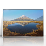 Modern art wall decor featuring a serene Taranaki landscape in muted earth tones on a framed acrylic panel.