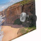 Large abstract wall art featuring oceanic blues and greens on acrylic glass, ideal for dining room ambiance.