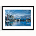 Abstract art print of a colorful, textured scene depicting the Buenos Aires skyline, set in a large black frame.