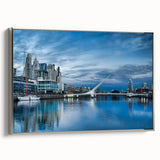 Landscape art painting of Buenos Aires on framed canvas, featuring colorful vintage poster art style with silver frame.