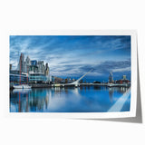 Extra large rolled canvas print featuring a floral landscape of Buenos Aires in muted green and pink tones.