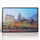 Large abstract wall art depicting a stylized Argentinian landscape in muted earth tones, framed in black acrylic.