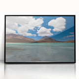 Large abstract wall art depicting a Bolivian landscape in muted earth tones, framed in black acrylic.