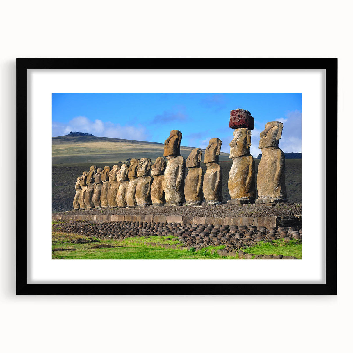 Abstract art print of a colorful, textured scenery in South America on a large framed black mat, ideal for living room decor.