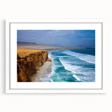 Abstract art print of a Peruvian landscape in muted earth tones on a framed white mat, suitable for dining room decor.