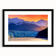 Abstract art print of Alaskan scenery in vibrant colors on a textured, extra large canvas, framed in black.